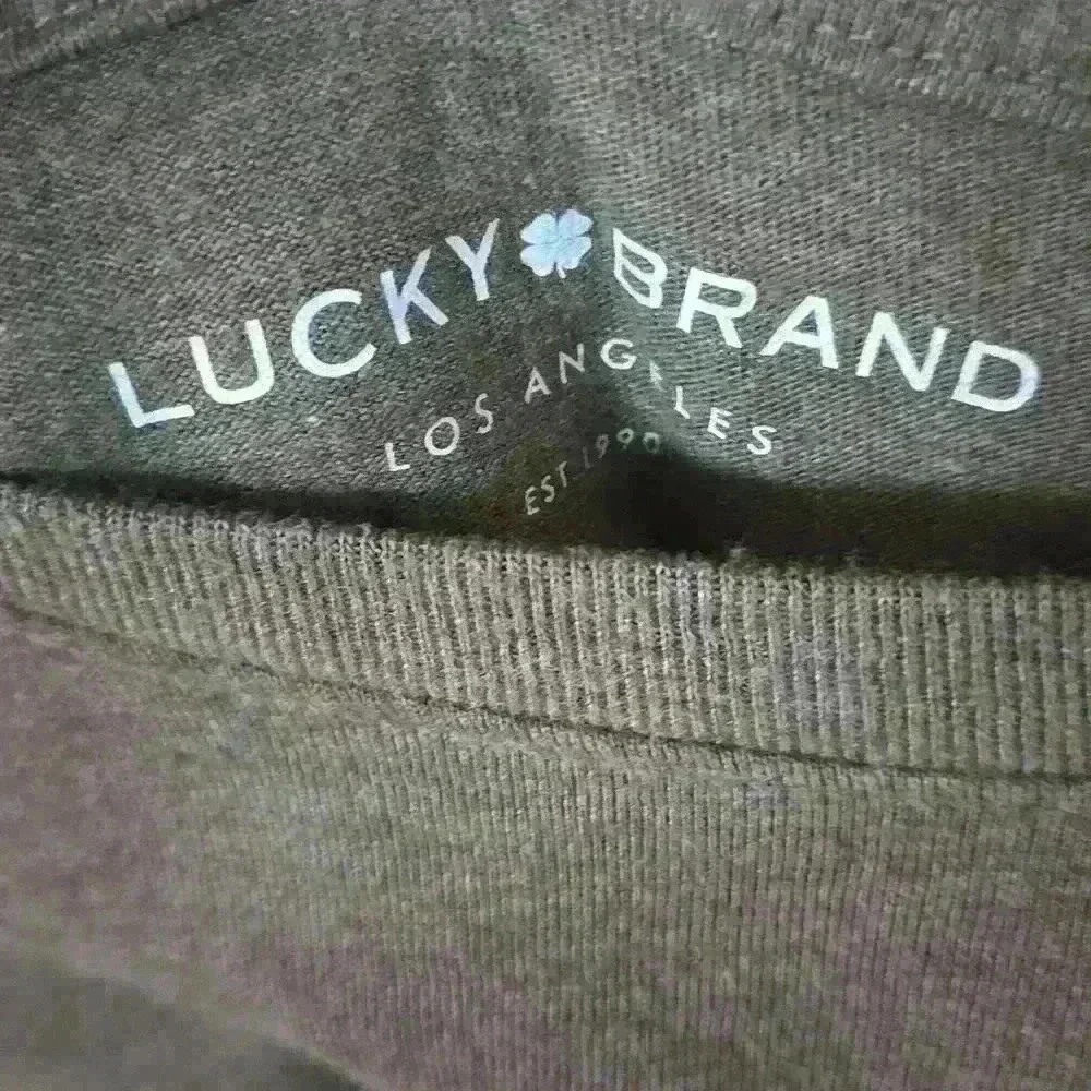 2 men's Large sized green tee shirts. 1 Lucky brand and 1 demim & flower brand. - Picture 8 of 8